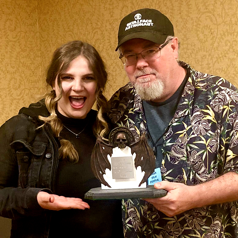 Kate Schmidt and Joe Sherlock with best feature award from 2025 cryptic Seattle film festival for the haunting of heather black